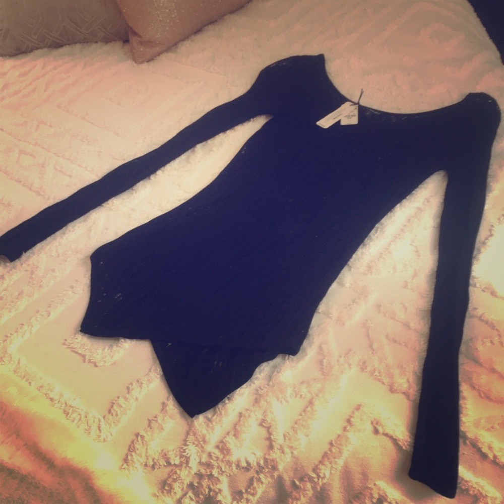 Express asymmetrical long sleeve shirt.